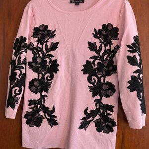 Pink and black applique sweater